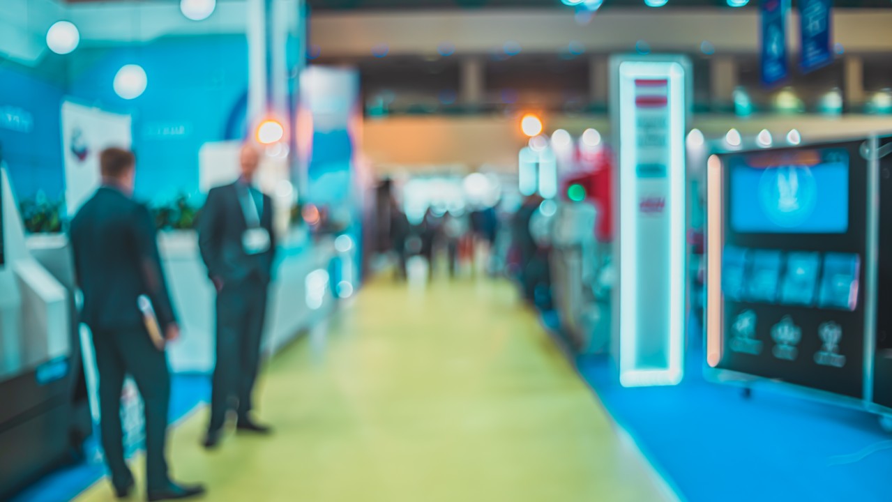people standing around in a convention center