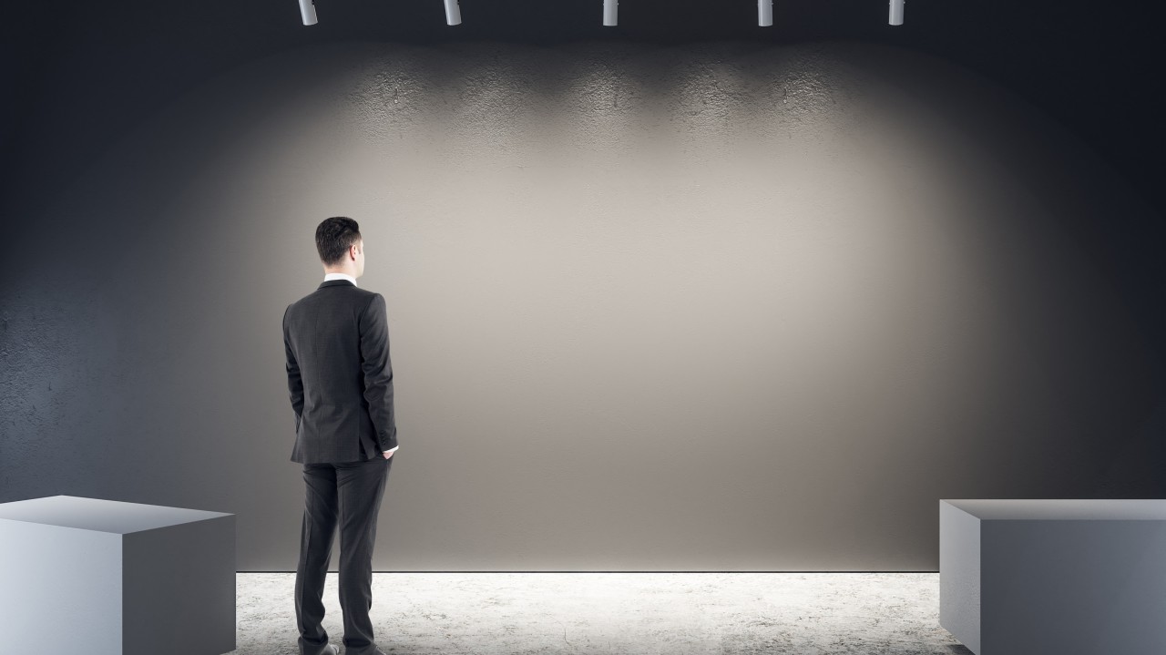 man stares at wall