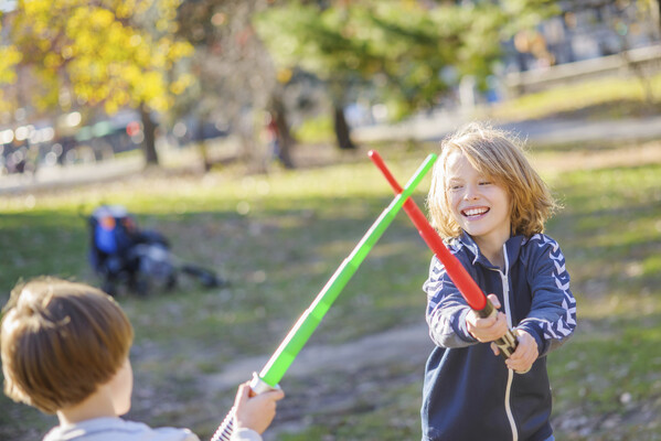 kids playing with swords