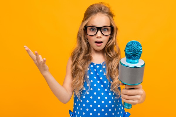 kid holding microphone